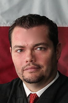 Headshot of Attorney Carlos R. Cortez